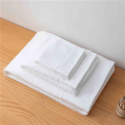 Wie lässt sich die Qualität von vier Hotelhandtüchern bestimmen?